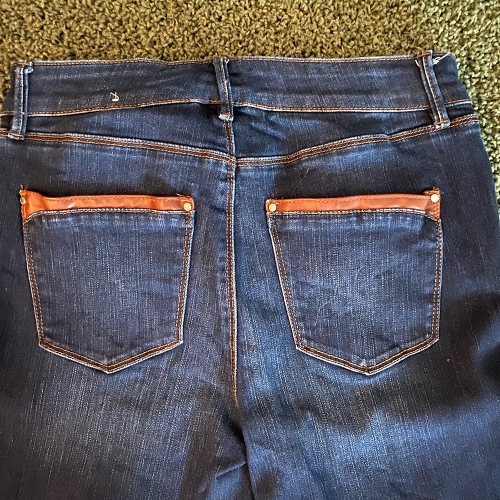 WHBM jeans with leather like trim